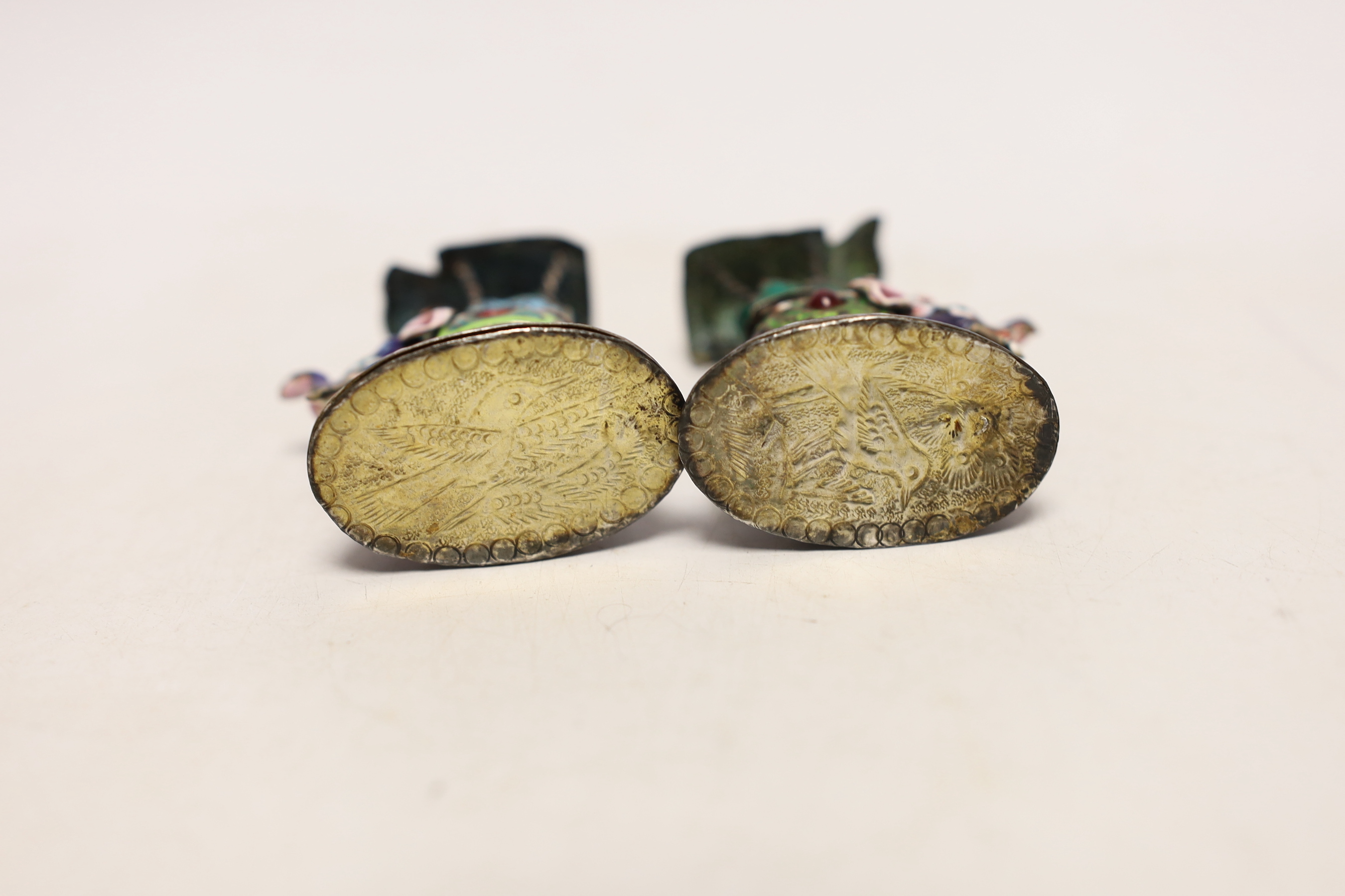 A pair of Indian gilt white metal and polychrome enamel elephants with howdahs, height 77mm.